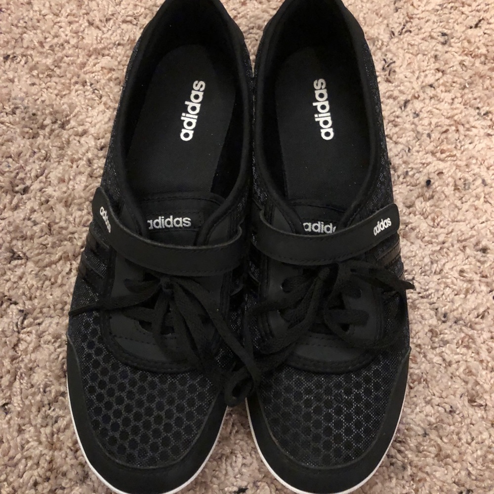 Adidas size 9.5 casual sneaker in black and white. Gently used condition